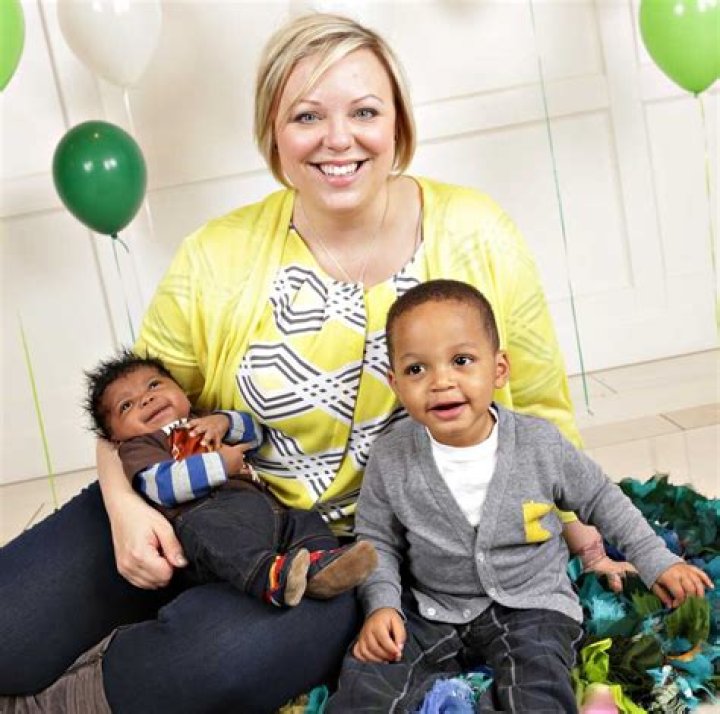 Are black babies less expensive to adopt?