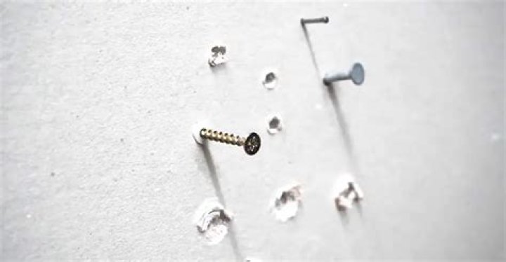 Can drywall mud be used to fill nail holes?