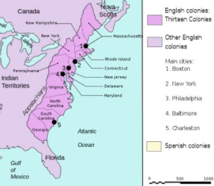 How did the geography of the New England colonies affect their economy?