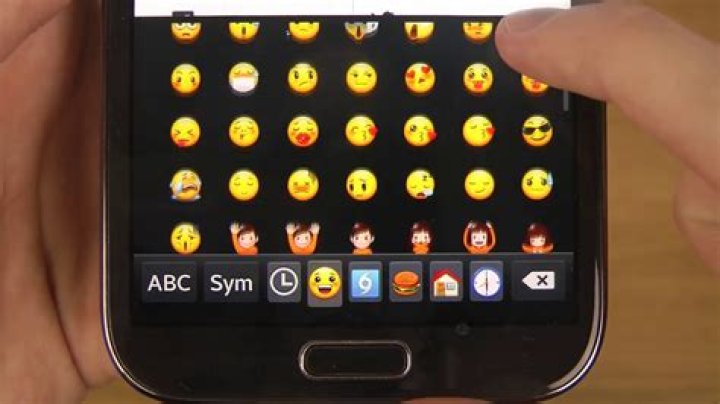How do I add emojis to my Samsung text messages?