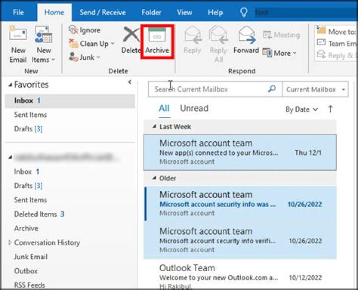 How do I archive emails in Outlook 2003?