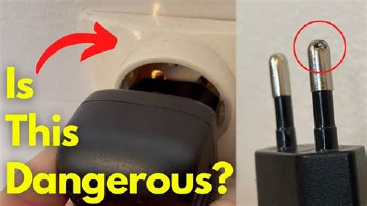 How do I stop my laptop charger from sparking?