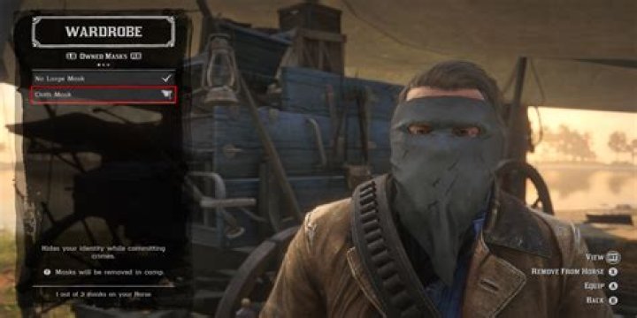 How do you access your wardrobe in Red Dead Redemption?