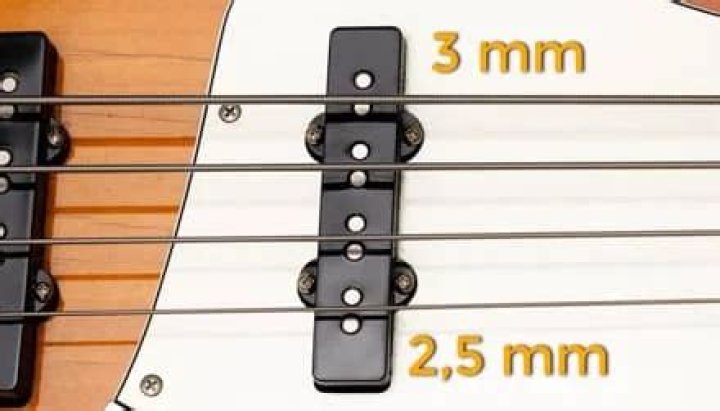 How do you adjust bass pickup height?
