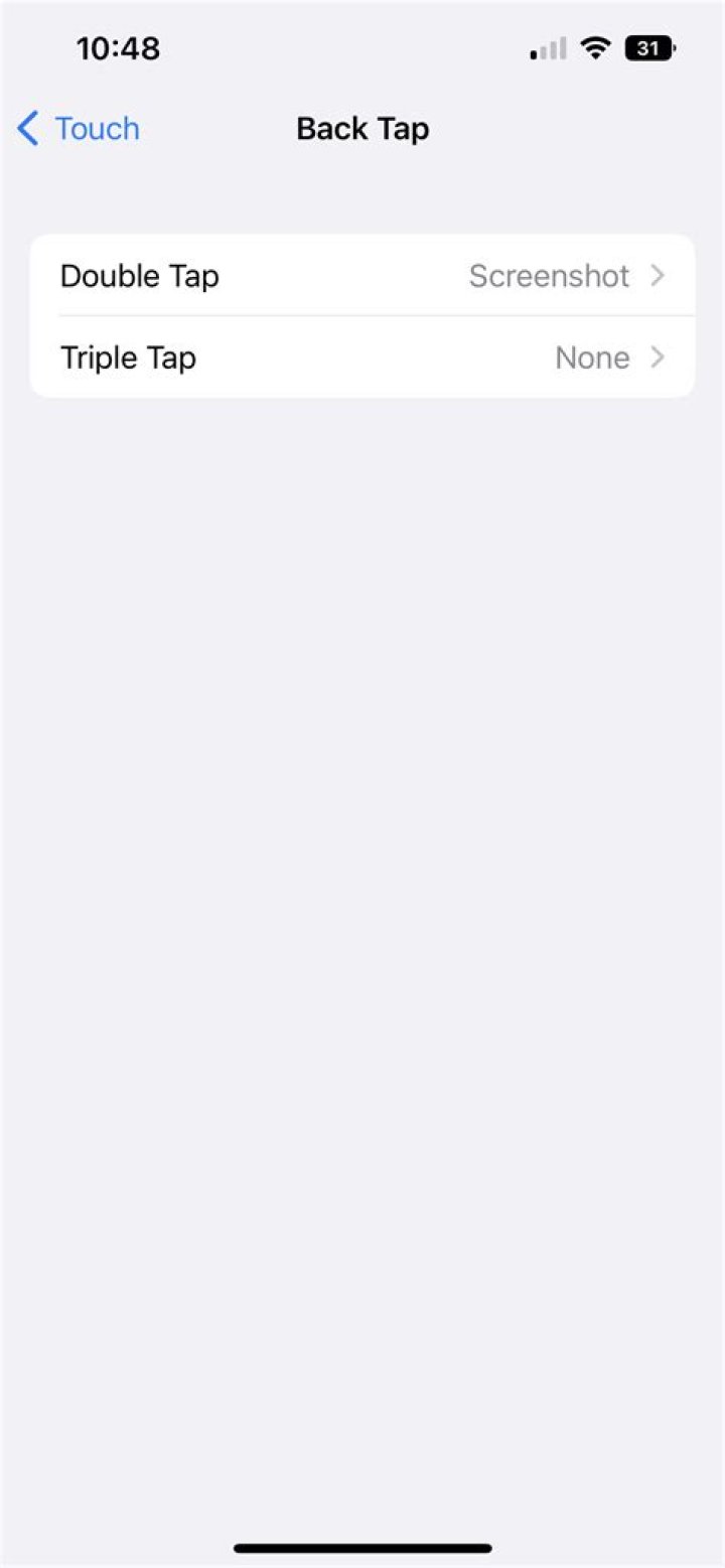 How do you enable tap screenshot on iPhone?