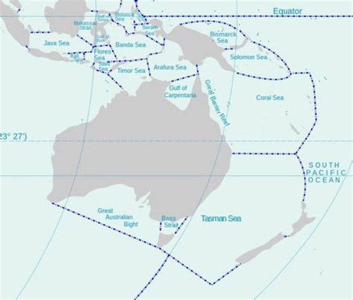 How many oceans and seas surround Australia?