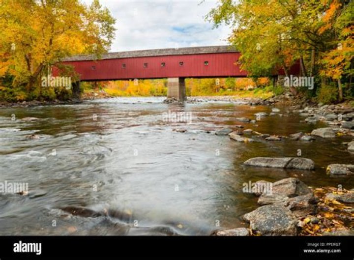 How many wooden covered bridges cross the Housatonic River?