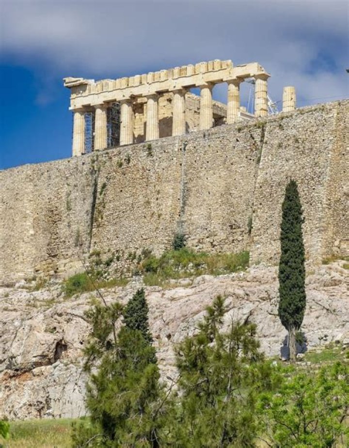 What is a fortified hill in ancient Greece?