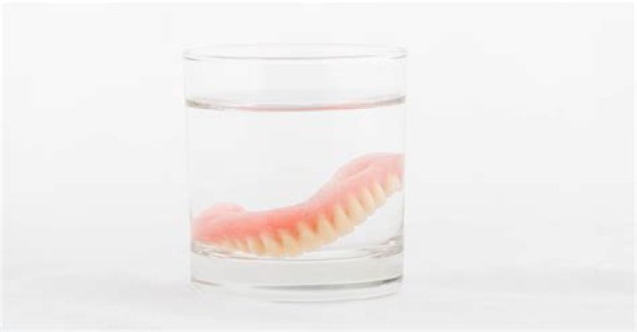 What is the best thing to soak your dentures in?