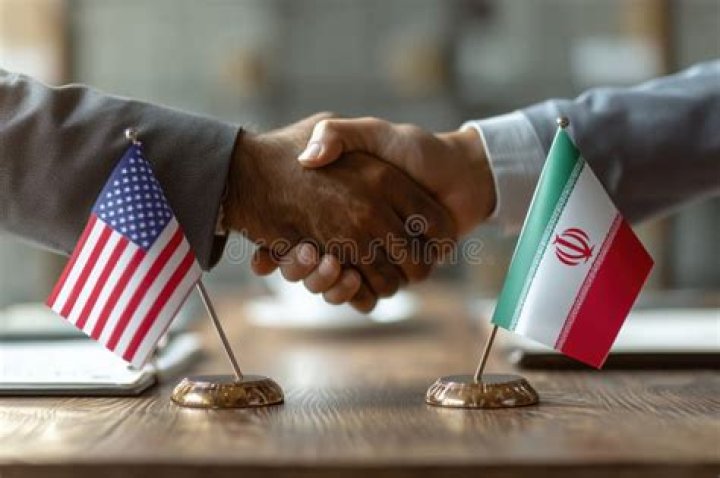 What principle of American democracy is at work when two opposing groups relax some of their demands in an attempt to reach an agreement?