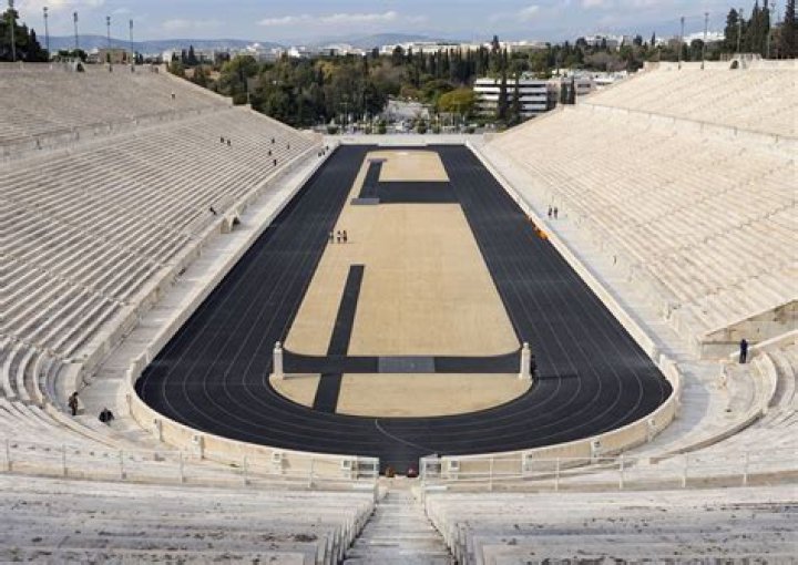 What were ancient Greek stadiums made of?