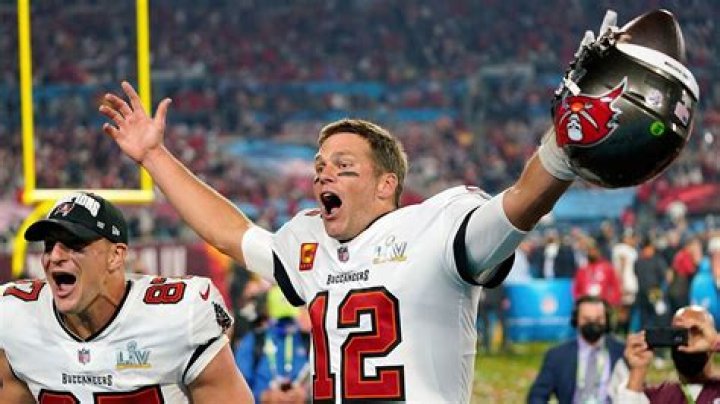 Who holds the most records in the NFL?