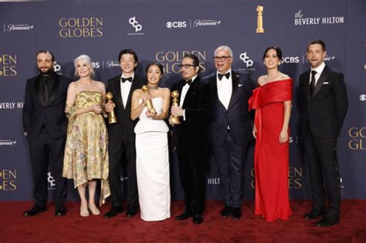 Who hosted 2014 Golden Globe Awards?