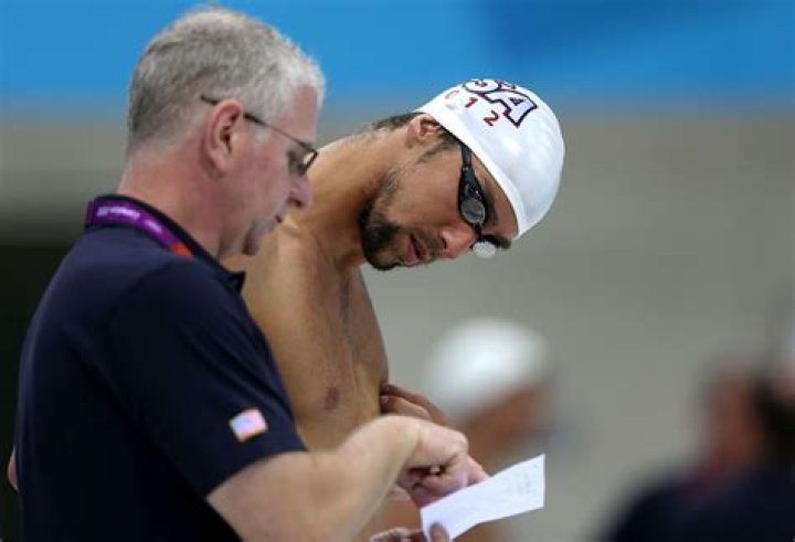 Why does Michael Phelps breathe every stroke?