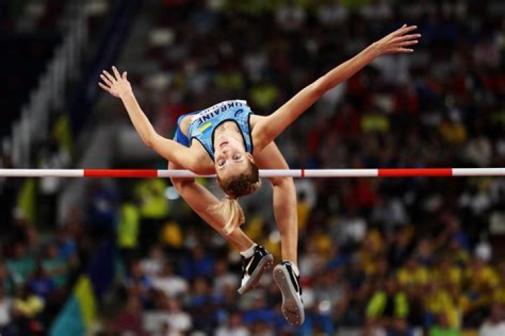 Why is high jump backwards?