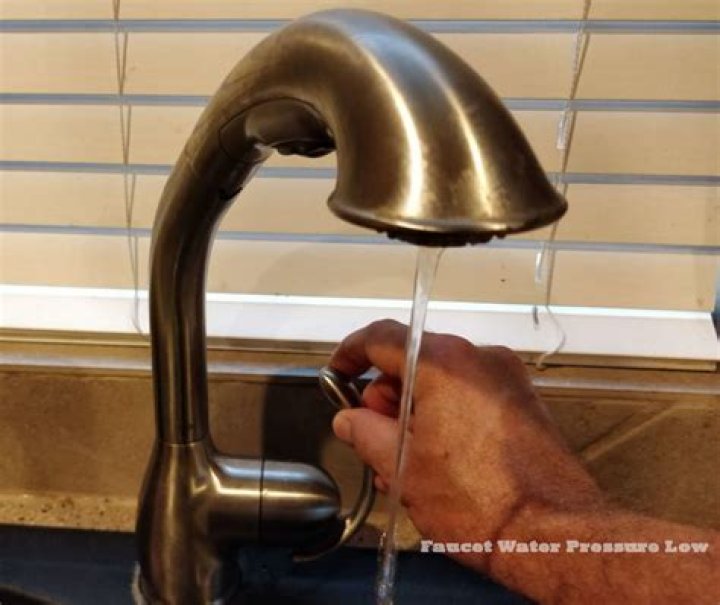 Why is my faucet water pressure low?